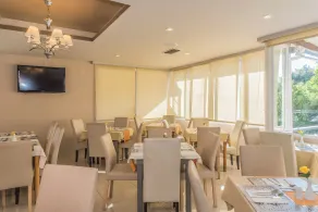 Planos Beach Hotel - Restaurant