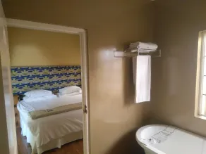 Sleepy Gecko Guest House - Badezimmer