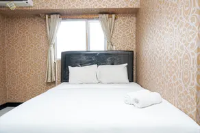 Amazing 1BR Apartment at The Wave Kuningan By Travelio - Zimmer