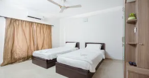 Kolam Gandhi Serviced Apartments - Adyar - Vue de la chambre