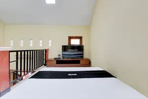 Capital O 93716 Family Guesthouse Syariah - Habitación