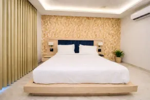 Hotel Holiday Grand - Chambre