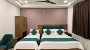 Hotel Triyugi - Camera