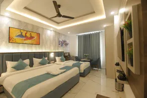 Treebo Premium Paarth Grand with Pure Veg Restaurant - Chambre