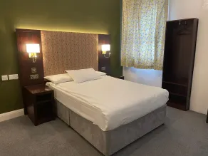 Acacia Hotel - Værelse