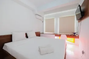 Town View 1BR at Patraland Urbano Apartment By Travelio - Zimmer