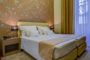 Americano Inn Rossio Hotel - Chambre