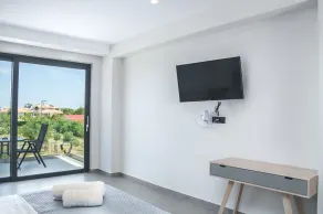 Dionisos Luxury Suites - Chambre