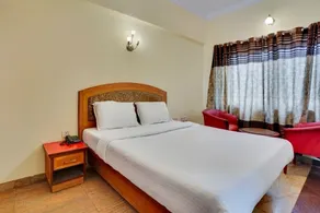 iROOMZ Aura Inn - Quarto