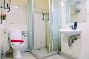 Modern 2BR at The Wave Epicentrum Apartment near Kuningan - Badezimmer