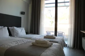 Alexiou Hotel - Zimmer