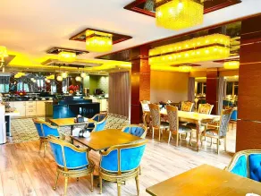 Real King Suite Hotel - Restaurant