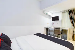 Hotel O Jalan Jenderal Sudirman Near Imam Bonjol Square Formerly Nelvi Guest House - Chambre