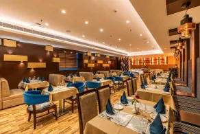 Divine Clarks Inn Suites - Restaurante