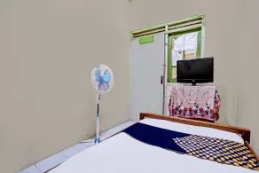Hotel O Nurul Homestay Syariah - Habitación