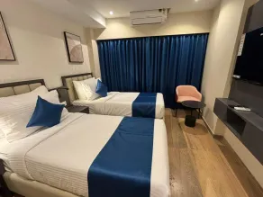 Grand Plaza Inn by RAK Rooms, Kannur - Chambre