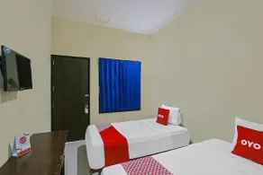 Hotel O Wahidin Guesthouse - Zimmer