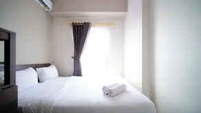 Best Price and Homey 1BR at Tamansari Prospero Sidoarjo Apartment By Travelio - Habitación