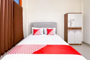 Urbanview Hotel Falah Residence Syariah By RedDoorz - Chambre