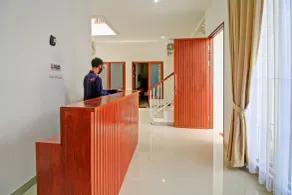 Hotel O Madania Guesthouse Syariah - Reception