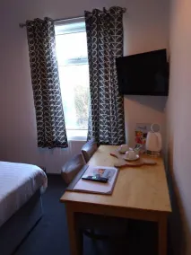 The Fountain Hotel - Chambre
