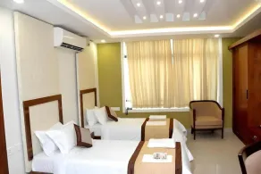 Royal Plaza Glitz Inn - Room