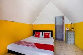 Cigadog Residence Mitra Reddoorz - Zimmer