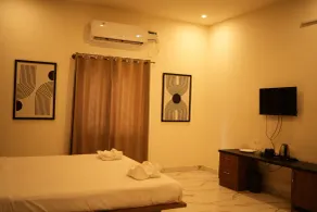 Hong Sau Resorts Thavarkere - Habitación