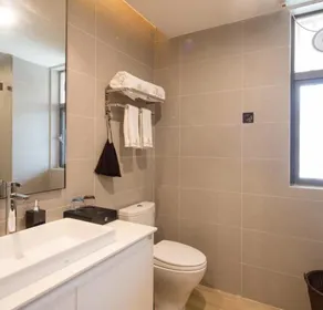 Poltton International Apartment Jinding - Bathroom