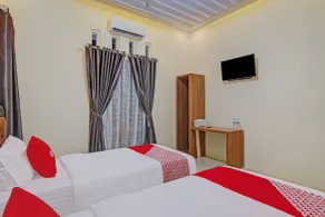 Capital O 90643 Suri Guest House Syariah - Room