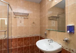 Iris Beach Hotel - Badezimmer