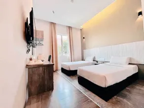 KARANG TIMUR Hotel - Værelse