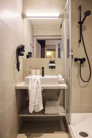 Hotel UND - smart alpine stay - Badrum
