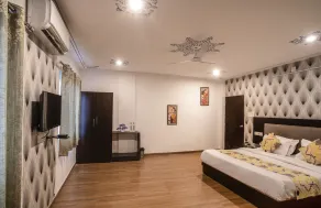 Tripli Hotels Arunoday Palace - Chambre