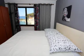 Appartement situé directement sur la mer, avec une vue imprenable et vue sur la mer - Chambre