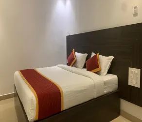 Treebo Aishwarya Grand - 4 km from Promenade Beach - Chambre