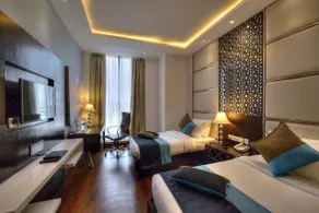 Hotel Delite Grand - Zimmer