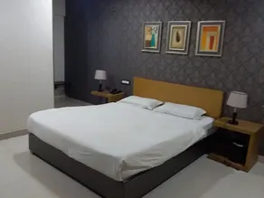Hotel Kasturi International - Chambre