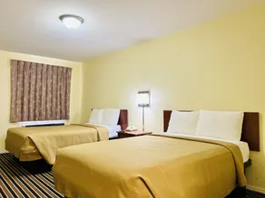 Suite 16 Motel - Værelse