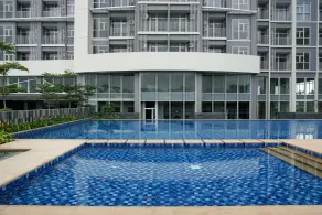Exclusive 1BR Ciputra International Apartment By Travelio - Pool