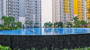 Modern Furnished 3BR at Springlake Summarecon Bekasi Apartment By Travelio - Pool