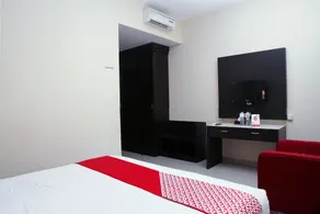 RedDoorz At Hotel Gajah Mada Palu - Zimmer
