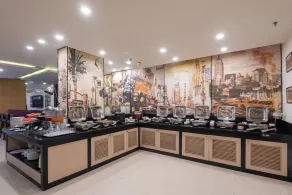 Mango Grove Hotel - Restaurant