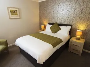 Village Inn - Habitación