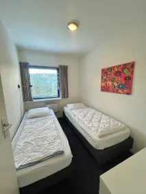 6 personnes Maison Marijke avec jardin d'hiver et accès direct au Lauwersmeer - Chambre