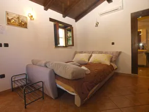 Familienfreundliche Ferienwohnung mit Grill und Terrasse - Zimmer