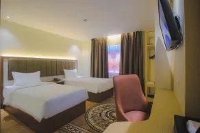 Qin Hotel Banjarbaru - Chambre