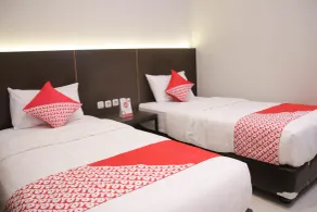 Hotel O Azzahra Guest House Syariah - Chambre