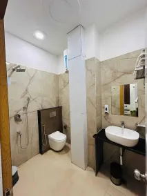 Hotel Govind Residency - Badezimmer