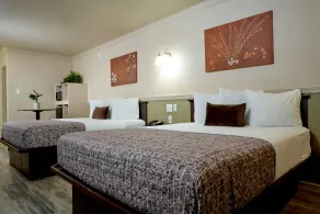 Family Garden Inn & Suites - Chambre